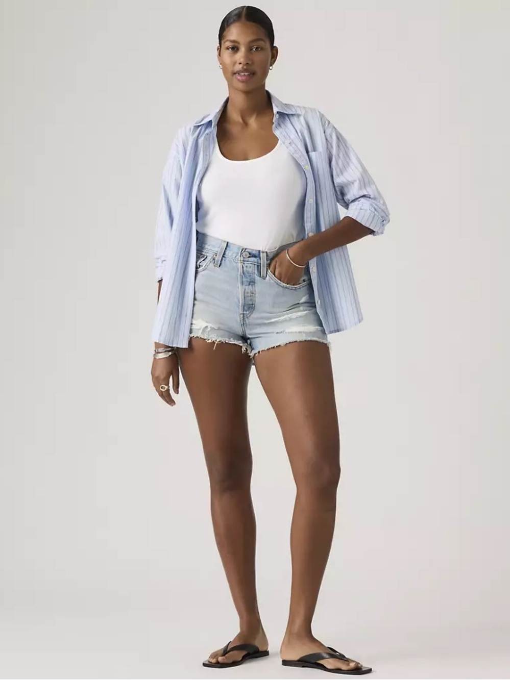 Levi's light blue denim jeans with brown leather patch